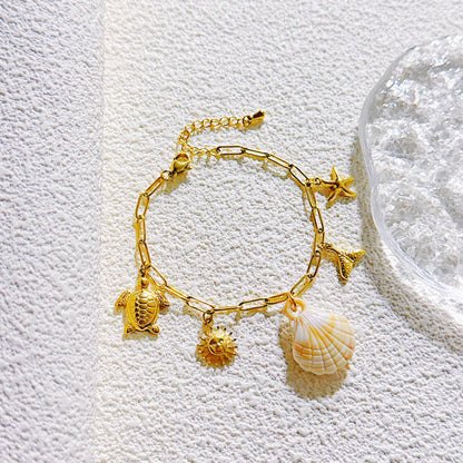 Vergoldetes Armband mit maritimen Anhängern aus Edelstahl, darunter Schildkröte, Sonne, Seestern &amp; Muschel