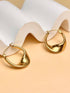 Goldene Statement-Creolen in fließender, organischer Form – eleganter Edelstahl-Schmuck, 18K vergoldet, nickel- und schadstofffrei
