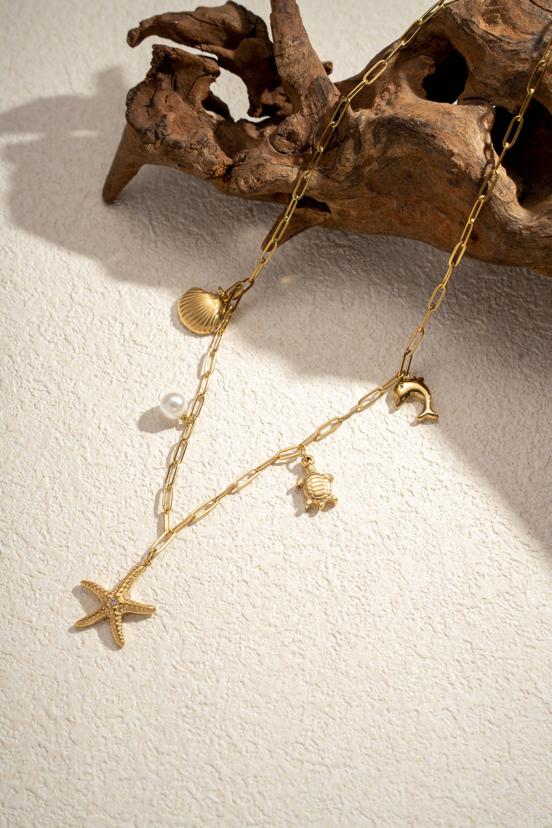 Statementkette mit Seestern, Schildkröte, Delfin, Perle und Muschel aus 18K vergoldetem Edelstahl